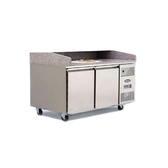Commercial refrigerator with a gray countertop on a white background