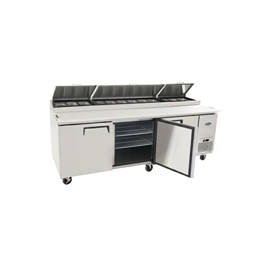 Stainless steel refrigerated counter with open door on a white background