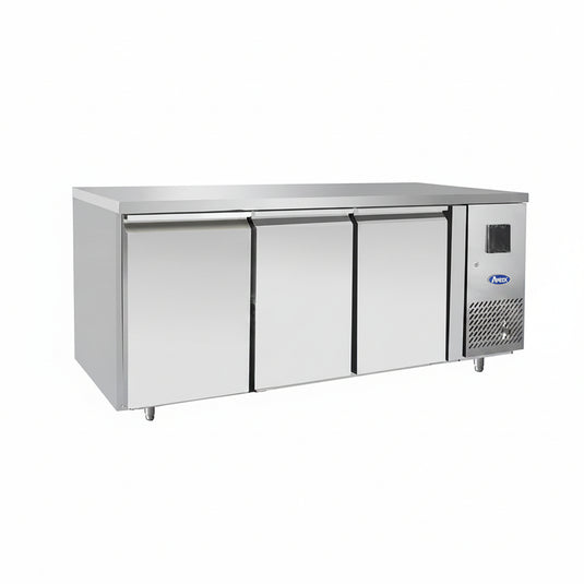 Stainless steel refrigerator with three doors on a white background
