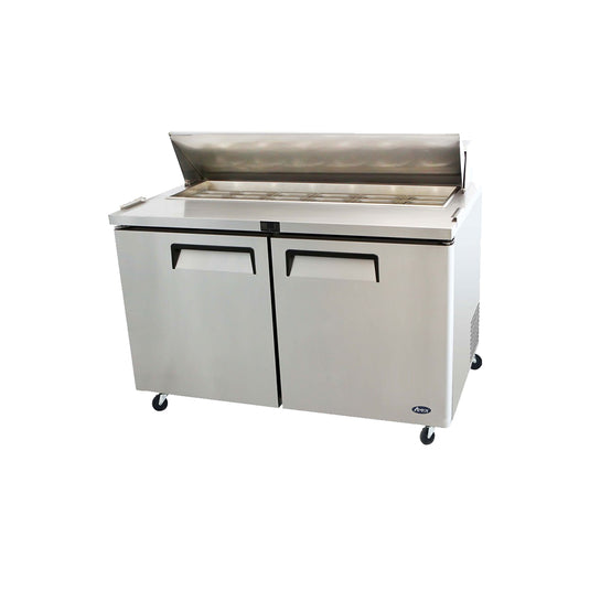 Stainless steel refrigerated prep table on a white background