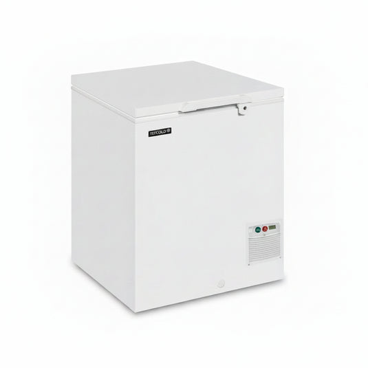 A white top-freezer chest freezer with a small black 'MAGNA-ICE' brand label on the upper left side, shown on a clean white background.